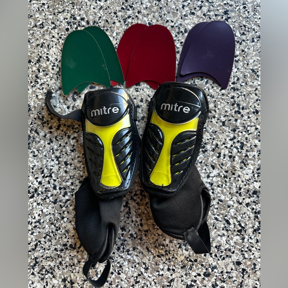 Mitre Kids Shin Guards with Interchangeable Colors